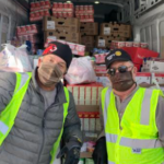 Team members at the Giving Plate load up a truck