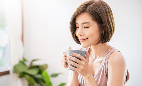 Woman Drinking Coffee